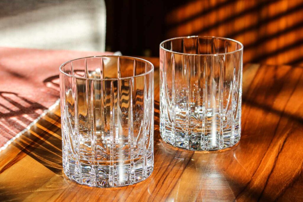 A sturdy old fashioned glass with its signature thick bottom.